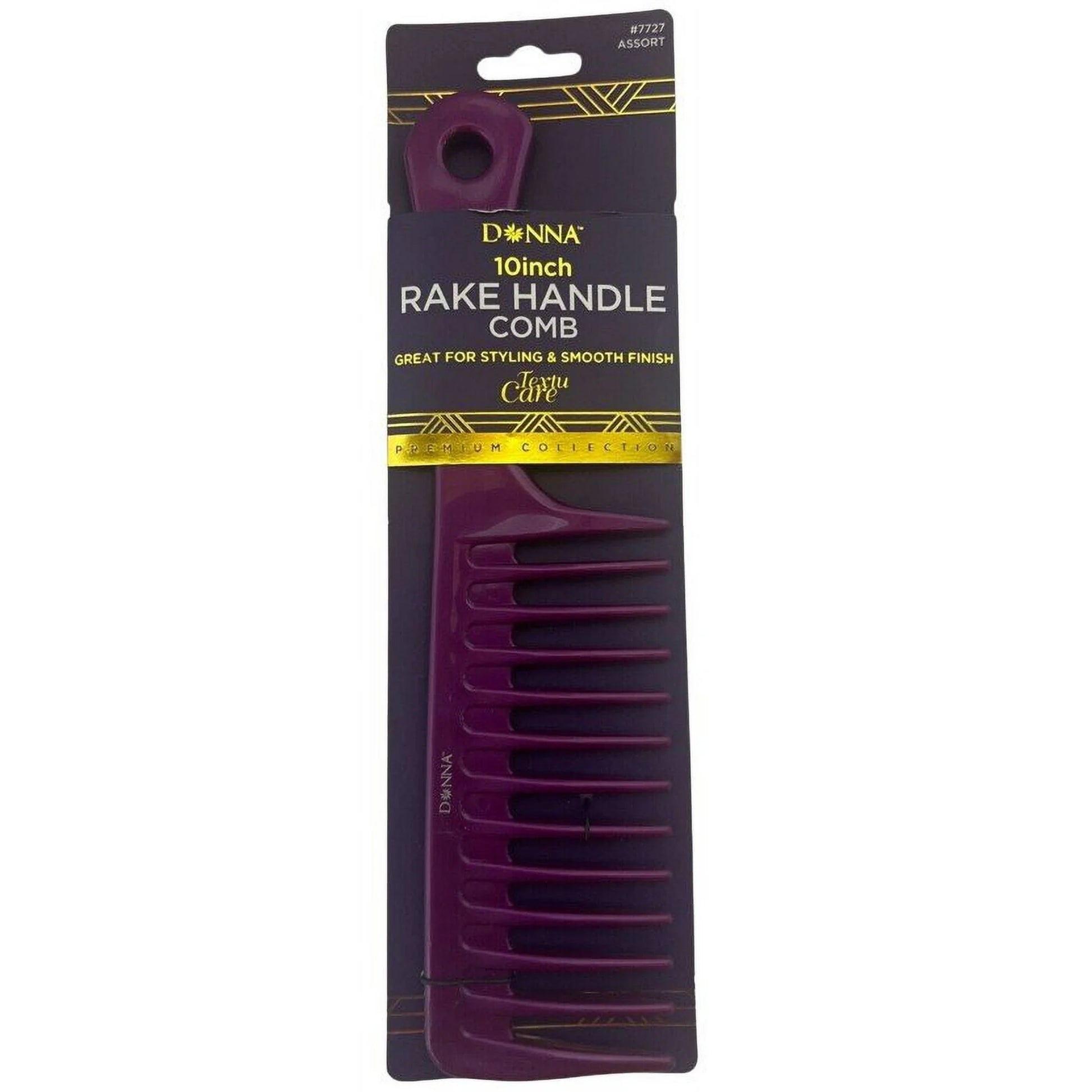 a purple comb in a packaging on a white background